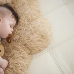 baby-with-a-natural-teether-during-his-naptime