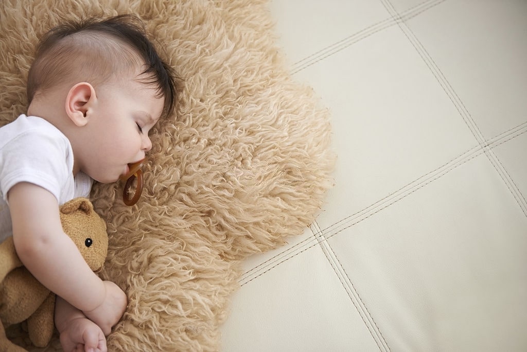 baby-with-a-natural-teether-during-his-naptime