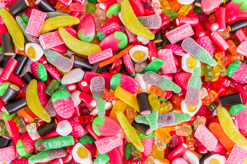 Assorted mix of colorful candies and gummy bears